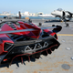 Illustration for article titled Lamborghini World Premiere Of Veneno Roadster - €3.3 Million Super Sports Car Makes Public Debut On Italian Aircraft Carrier In Abu Dhabi